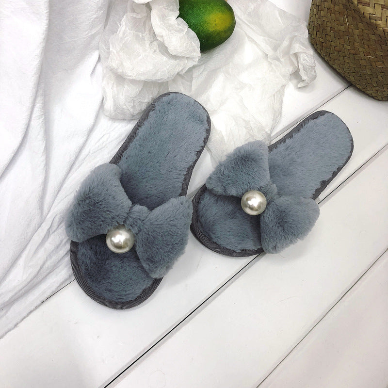 Home non-slip slippers female 2021 autumn and winter new word pearl cotton slippers Korean suede bow cotton drag